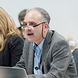 OHTAC member talking at a meeting